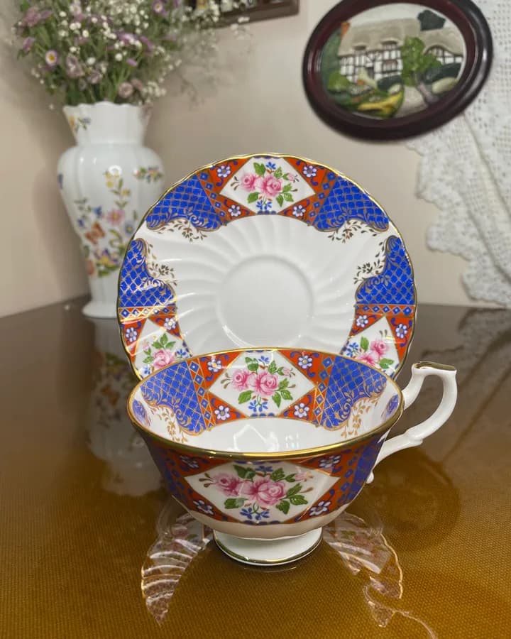 فنجان و نعلبکی هادسون و میدلتون آبی و نارنجی؛ قاب رز