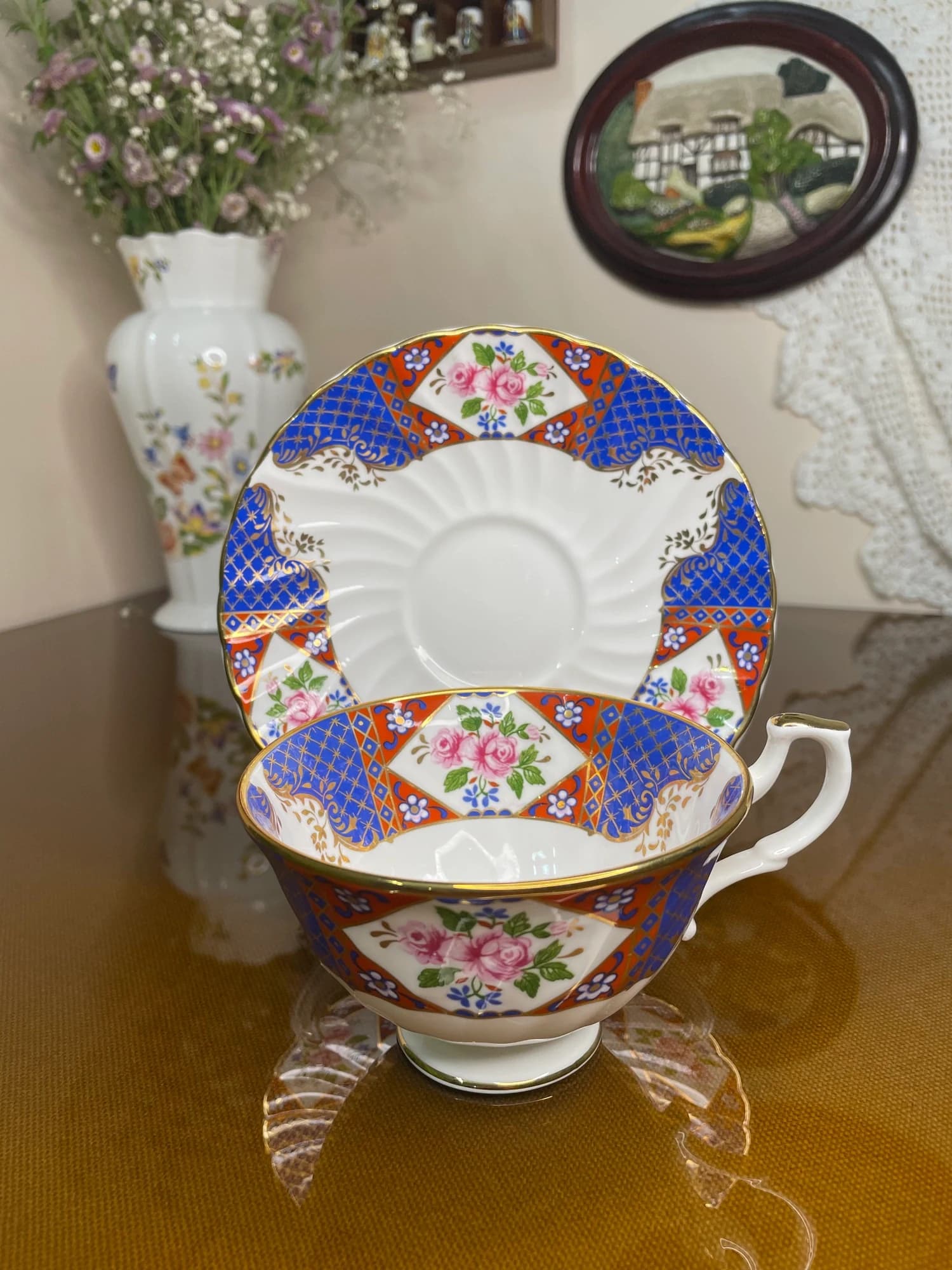 فنجان و نعلبکی هادسون و میدلتون آبی و نارنجی؛ قاب رز